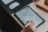 Photo of a tablet with a technical drawing on the screen with someone using a tablet pen to draw with. Photo of a tablet with a technical drawing on the screen with someone using a tablet pen to draw with.
